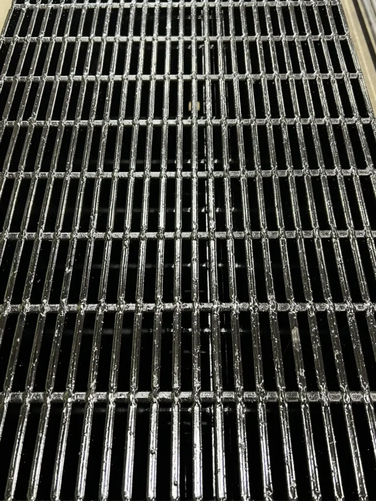ADA wheel safe grating painted black